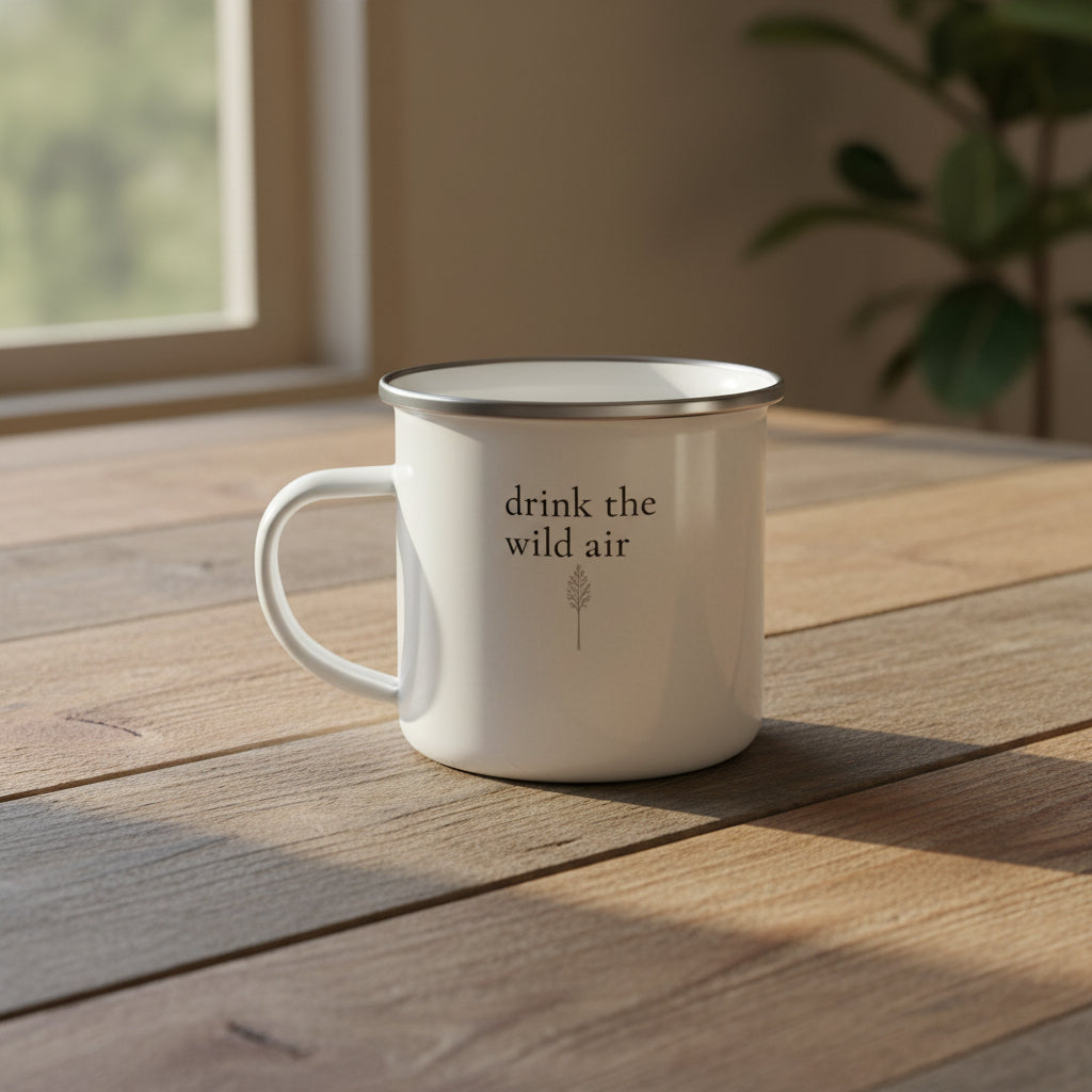 white enamel mug on reclaimed wood table